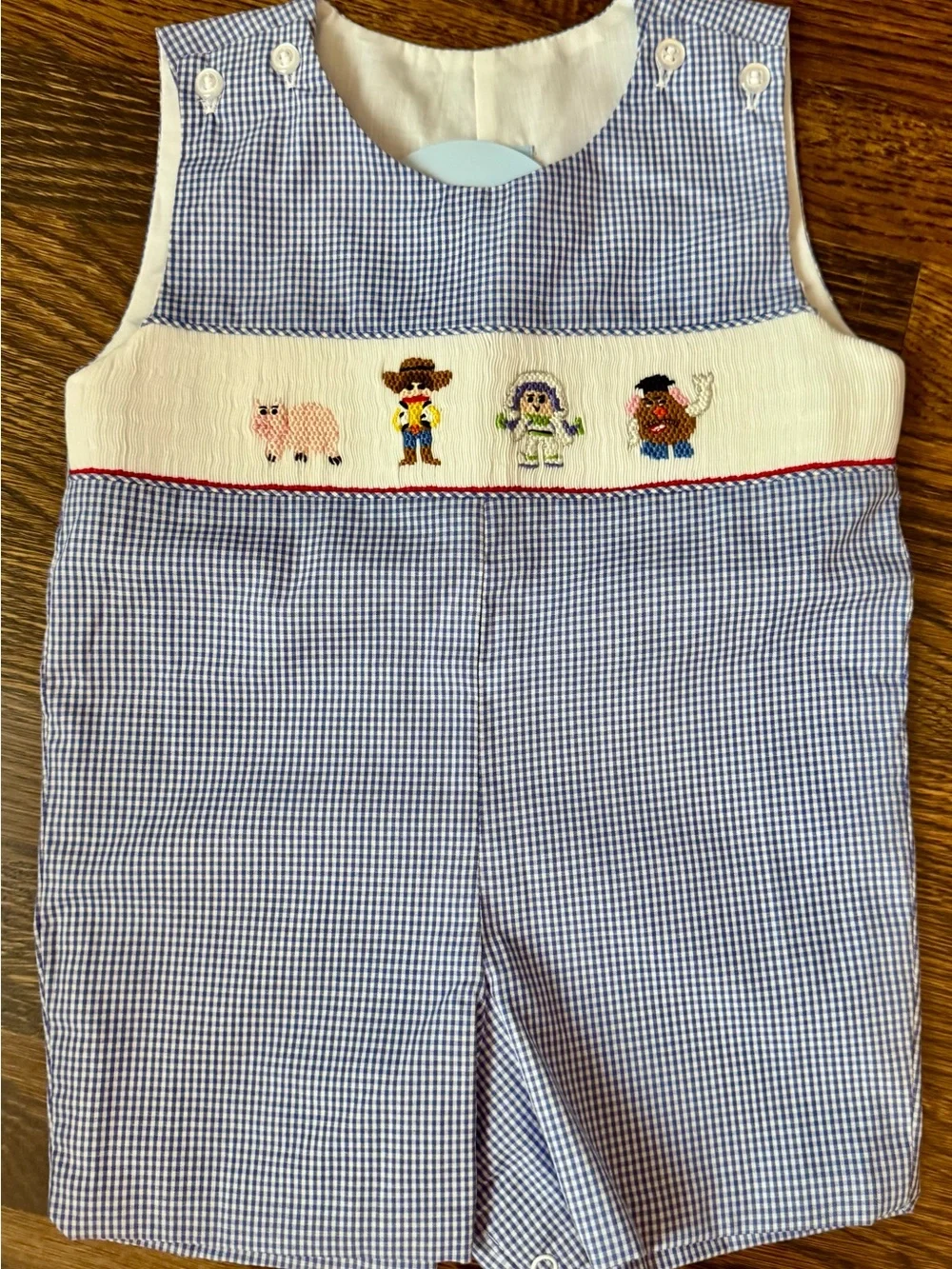 Classic Whimsy Blue Gingham Smocked Baby Toy Story Romper- NWT 12 Months